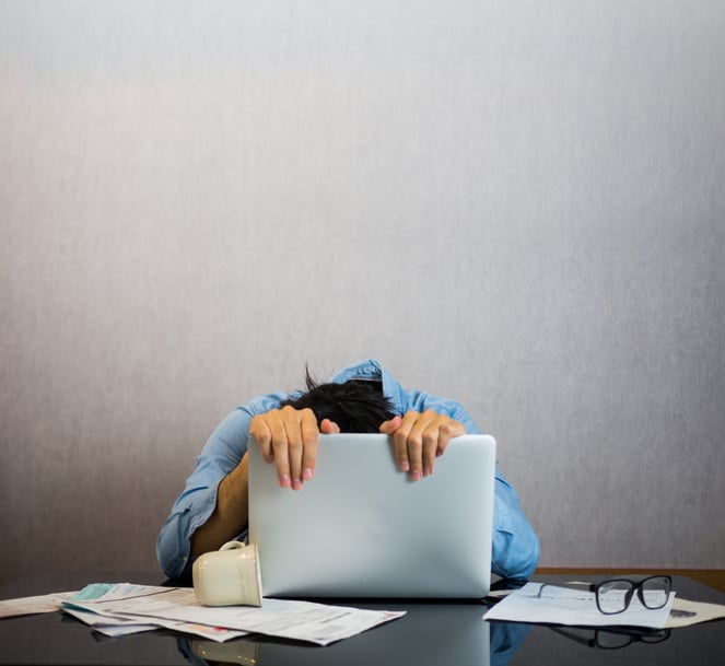 Frustrated man at computer